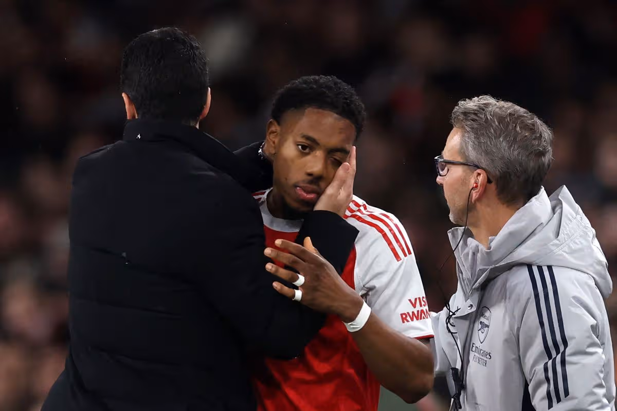     Mikel Arteta manager/head coach of Arsenal with Myles Lewis-Skelly 